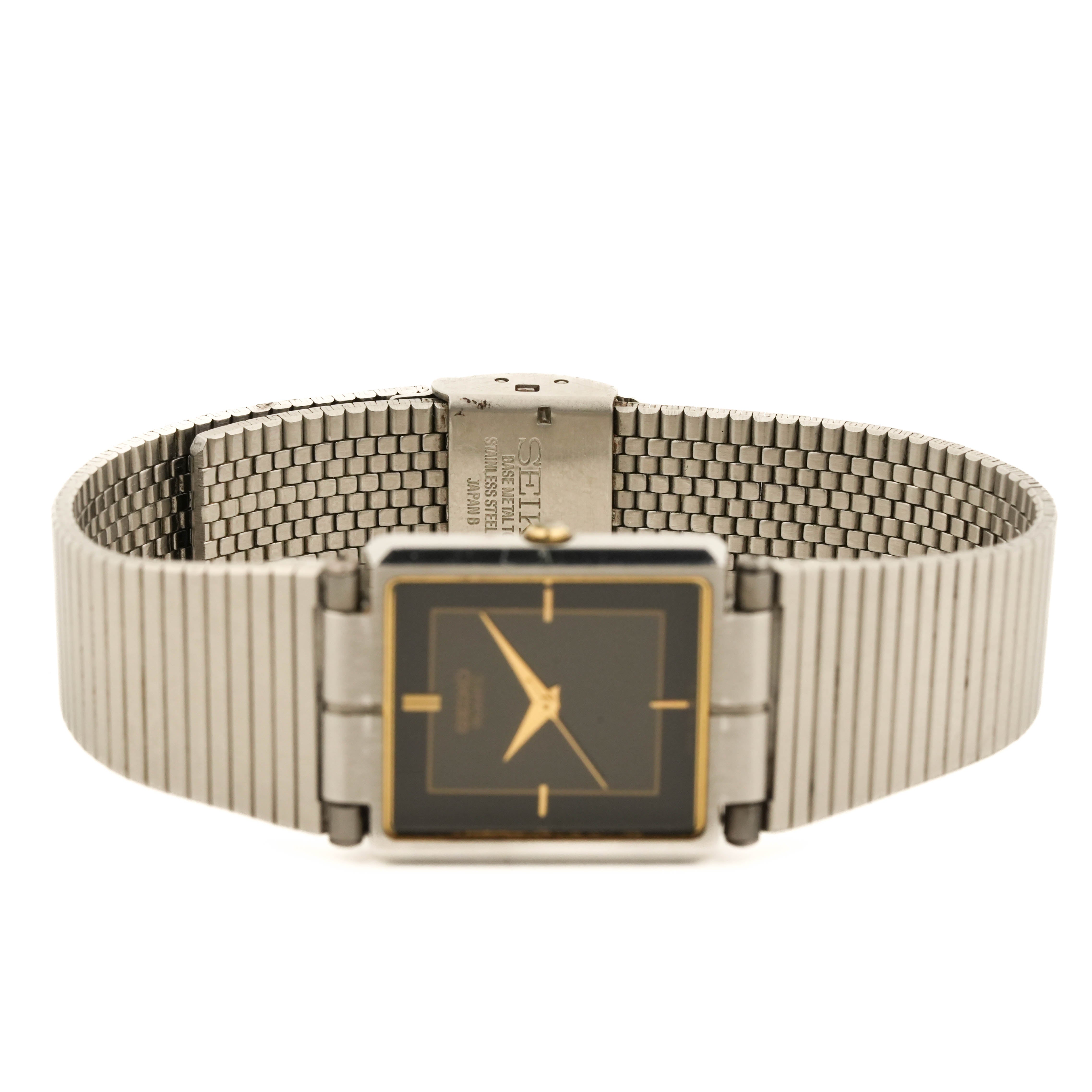 Seiko 7321-5680 Vintage Two-Tone Quartz Tank Dark Dial Ribbed Bracelet