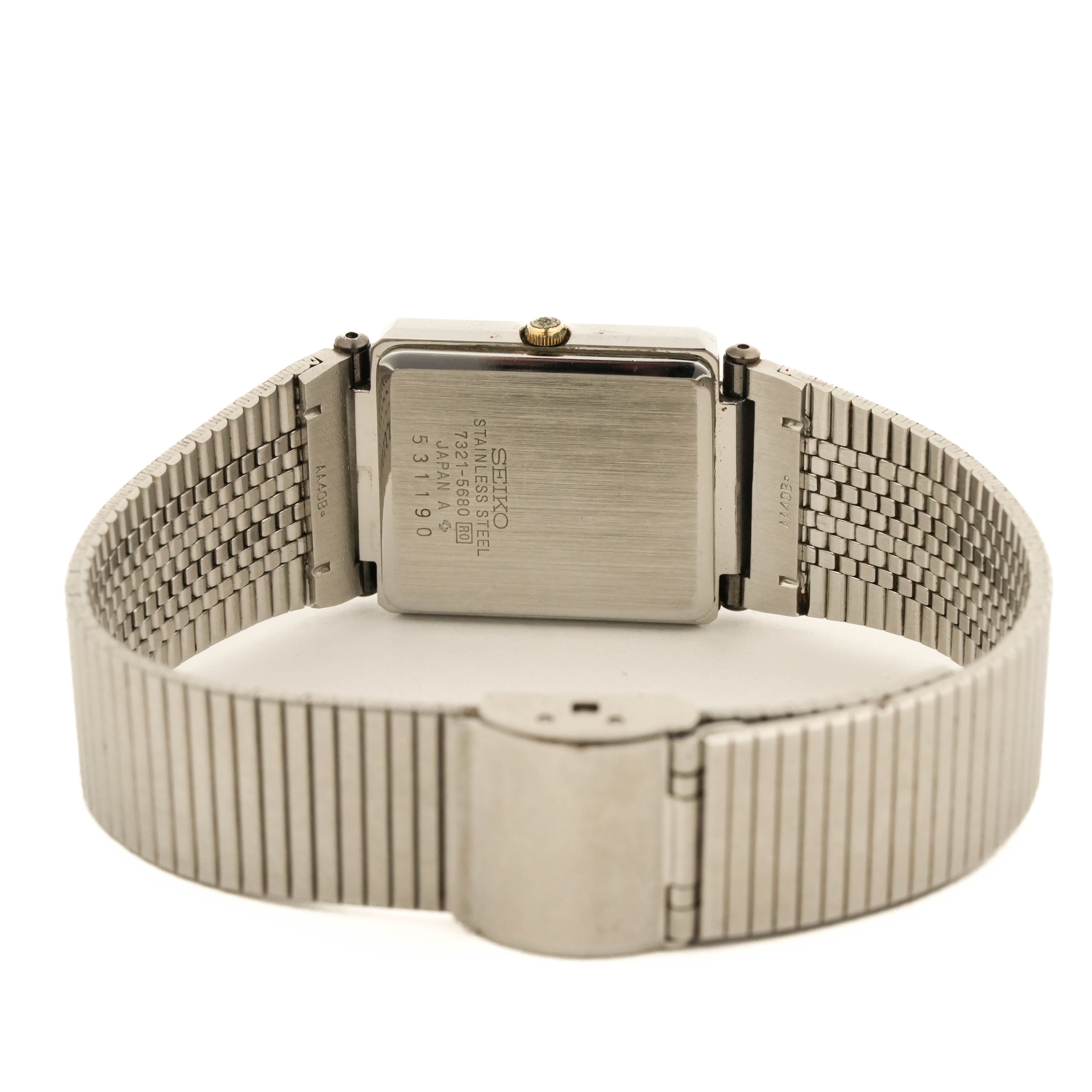 Seiko 7321-5680 Vintage Two-Tone Quartz Tank Dark Dial Ribbed Bracelet