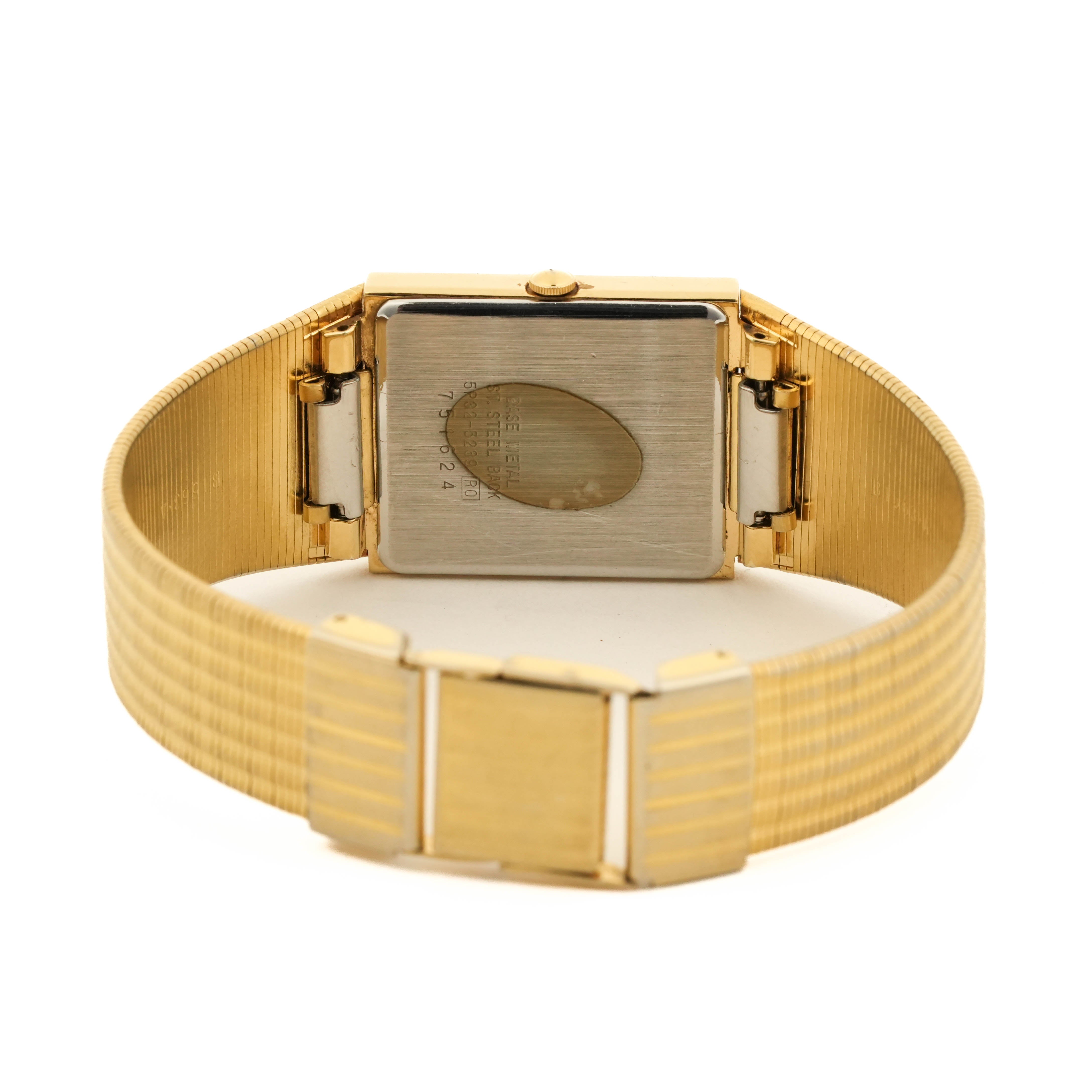 1987 Seiko 5P32-5239 Gold Tank Quartz Herringbone Champagne Dial