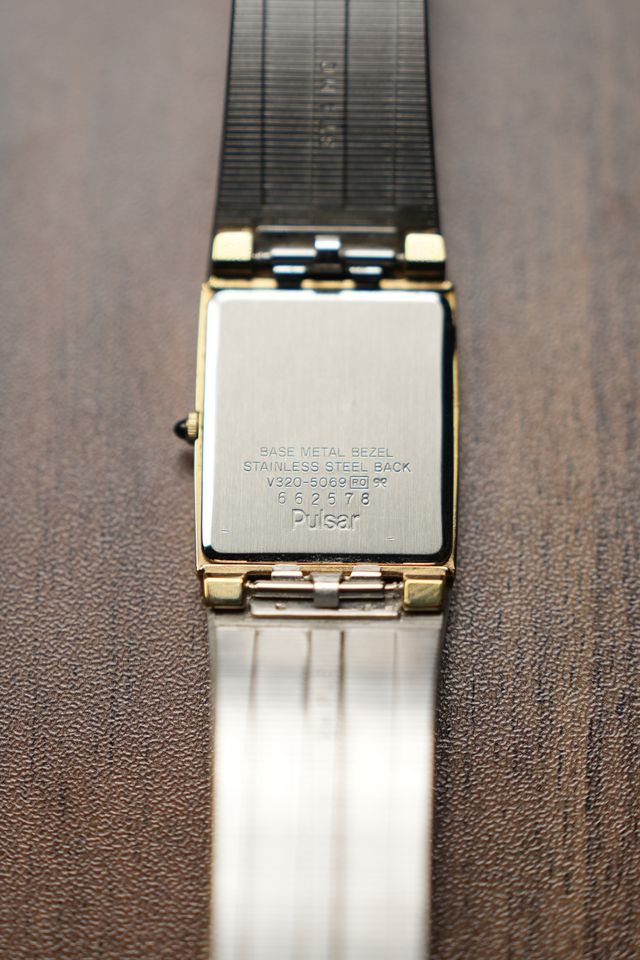 Pulsar Gold Black Dial Tank