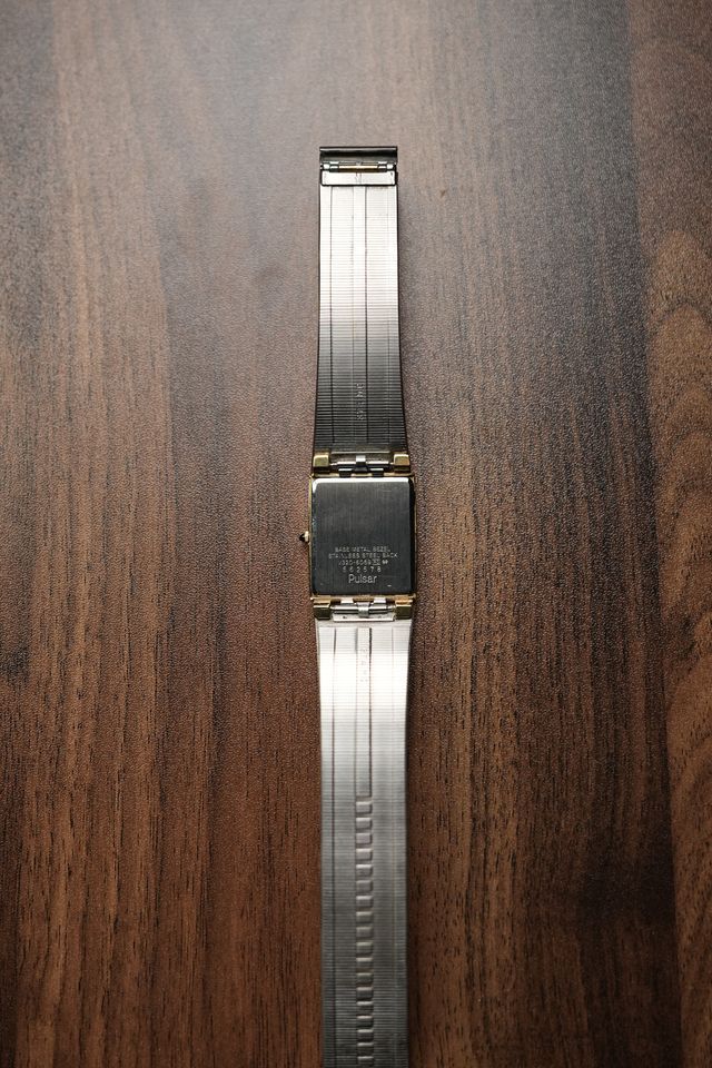 Pulsar Gold Black Dial Tank