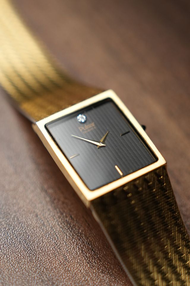 Pulsar Gold Black Dial Tank